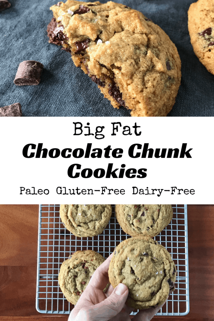 Big Fat Chocolate Chunk Cookies on a baking rack and split in on half on a blue napkin