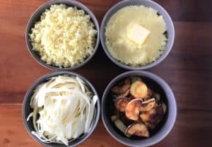 4 bowls of parsnips on a wooden table: parsnip rice, mashed parsnips, parsnip noodles and roasted parsnips