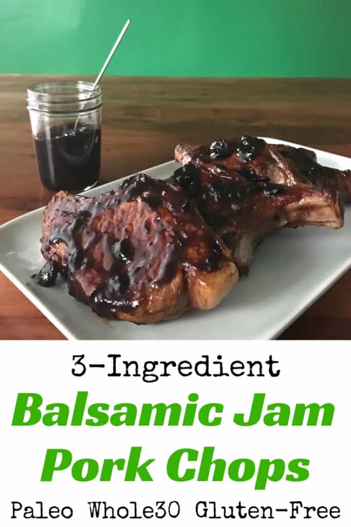 3-Ingredient Balsamic Jam Pork Chops on a white platter on a wooden table with a glass jar and spoon filled with the sauce