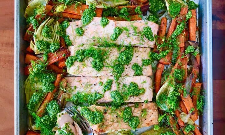 a healthy sheet pan salmon recipe on a wooden table
