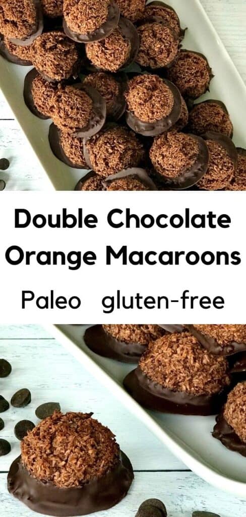 Double Chocolate Orange Macaroons piled onto a white platter surrounded by chocolate chips